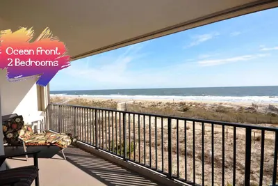 Image de Condo confortable de 2 chambres face à l'océan avec vue imprenable depuis le balcon couvert et WiFi gratuit situé à Midtown et à quelques pas de la plage!