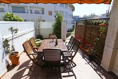 Image de Magica Maison de ville avec piscine commune. Plage à 100m