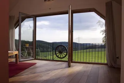 Image de Turmsuite Hofgut Held, fantastique pour les amoureux avec une vue inoubliable