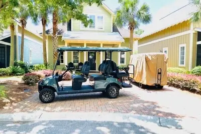 Image de Bungalo acceptant les animaux de compagnie avec véranda arrière blindée et Chariot De Golf à 6 places