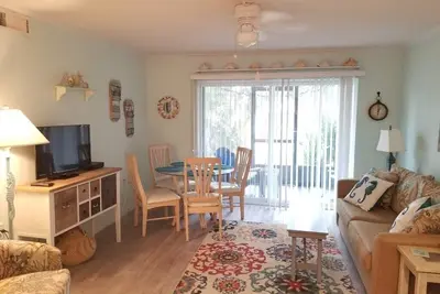 Image de Pelican Inlet B115, Condo au rez-de-chaussée, Stationnement pour bateaux, Piscine, Terrain de tennis