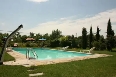 Image de Bel appartement avec Wifi, piscine, Tv, animaux admis et parking, près de Cortone