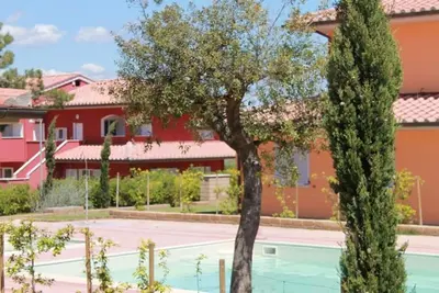Image de Joli appartement avec climatisation, Wifi, piscine, Tv, animaux admis et parking
