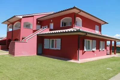 Image de Confortable appartement avec piscine, Wifi, climatisation, Tv, patio, animaux admis et parking