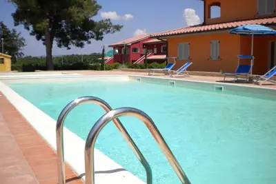 Image de Agréable appartement avec climatisation, piscine, Wifi, Tv, balcon, animaux admis et parking