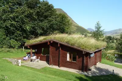 Image de Log Cabin avec bain bouillonnant | 4 personnes | Dans le parc national de Cairngorm | accepte les chiens
