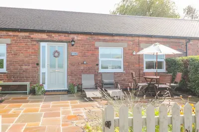 L'Byre, les animaux de compagnie à Hollington, Derbyshire, Ref 933893