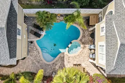 Image de Liberty View | Accueil piscine de luxe avec vue sur le parcours de golf et salle de jeux - Minutes de Disney!