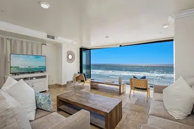 Image de Nouveau front de mer 11br \/ 11ba maison sur le sable w \/ terrasse sur le toit, un spa, A \/ C équipée
