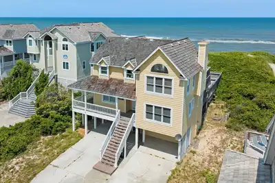 Image de Sunny Side: Oceanfront, piscine privée avec toboggan, 6 chambres, superbe communauté.