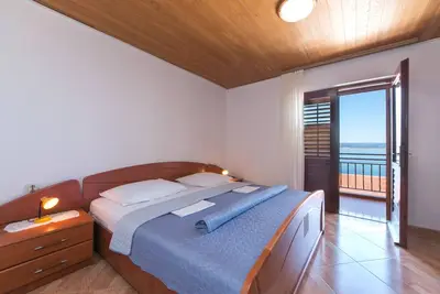Image de Appartement de deux chambres avec le balcon et la vue sur le mer Brela, Makarska (A-2752-b)