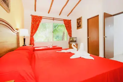 Image de Chambre Budget Exécutive Avec Piscine Climatisation Et Parking