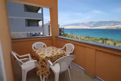 Image de Appartement de deux chambres avec la terrasse et la vue sur le mer Pag (A-6526-a)