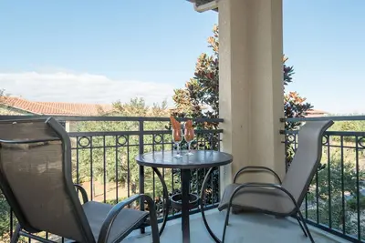 Image de Beau condo 4 chambres avec berceau grand format, commodités de la station, près de Disney