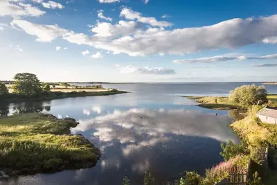 Image de Budle Bay Loft - 6 personnes, penthouse au troisième étage avec une vue fantastique sur l'estuaire
