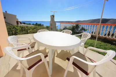 Image de Appartement de deux chambres avec la terrasse et la vue sur le mer Vlasici, Pag (A-9324-b)