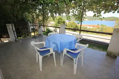 Image de Appartement de deux chambres avec la terrasse et la vue sur le mer Vis (A-8448-c)