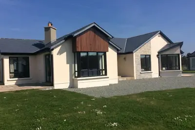 Image de Une maison de vacances pouvant accueillir 8 personnes dans 4 chambres