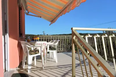 Image de Appartement de deux chambres avec la terrasse et la vue sur le mer Veli Rat, Dugi otok (A-436-a)