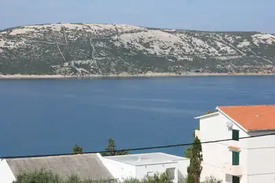 Garçonnière avec le balcon et la vue sur le mer Stara Novalja, Pag (As-6319-c)
