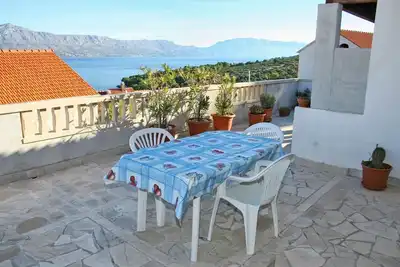 Image de Appartement d'une chambre avec la terrasse et la vue sur le mer Postira, Brac (A-2919-a)