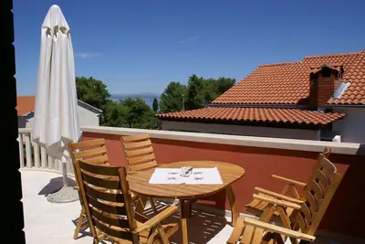 Appartement de trois chambres avec la terrasse et la vue sur le mer Supetar, Brac (A-4274-b)