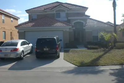 Image de Immaculate Family Home Sleeps 10 Gated Community Solana 20 Mins Disney