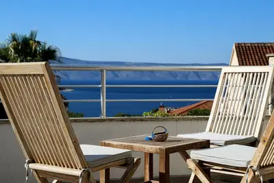 Image de Appartement de trois chambres avec la terrasse et la vue sur le mer Jelsa, Hvar (A-5703-b)