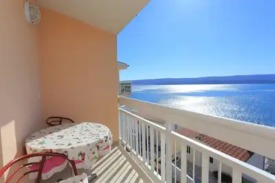 Image de Appartement d'une chambre avec le balcon et la vue sur le mer Stanici, Omis (A-2818-c)