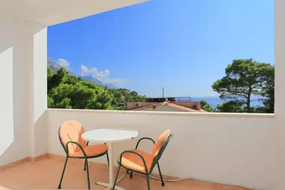 Image de Appartement de deux chambres avec la terrasse et la vue sur le mer Brela, Makarska (A-6688-a)