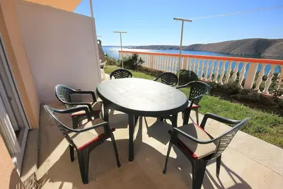 Image de Appartement de deux chambres avec la terrasse et la vue sur le mer Vlasici, Pag (A-9324-a)