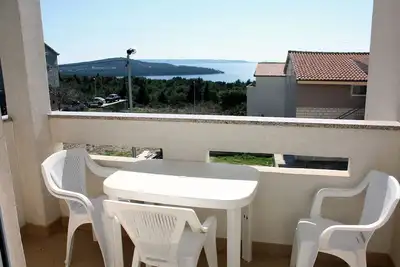 Image de Appartement d'une chambre avec le balcon et la vue sur le mer Seget Vranjica, Trogir (A-4870-b)