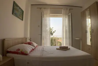 Image de Appartement de deux chambres avec le balcon et la vue sur le mer Lun, Pag (A-9395-b)