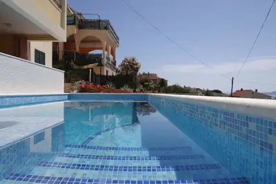 Image de Piscine chauffée, superbe terrasse vue mer a6