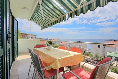 Image de Appartement de trois chambres avec la terrasse et la vue sur le mer Razanj, Rogoznica (A-4322-a)