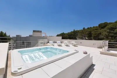 Image de 948 Villa Paradise - Appartement au Rez-de-Chaussée