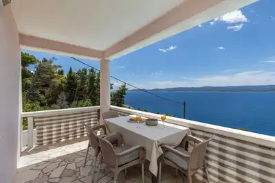 Image de Appartement de deux chambres avec la terrasse et la vue sur le mer Mimice, Omis (A-2754-b)