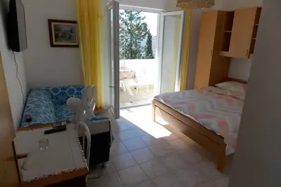 Appartement d'une chambre avec le balcon et la vue sur le mer Barbat, Rab (A-4862-a)