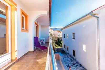 Image de Appartement de trois chambres avec le balcon et la vue sur le mer Povile, Novi Vinodolski (A-12039-a)