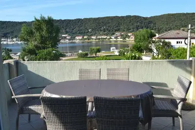 Image de Appartement de deux chambres avec la terrasse et la vue sur le mer Supetarska Draga - Donja, Rab (A-2019-a)