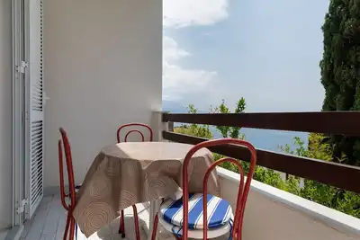 Image de Appartement d'une chambre avec la terrasse et la vue sur le mer Pisak, Omis (A-5975-c)