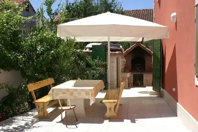 Appartement de deux chambres avec la terrasse et la vue sur le mer Supetar, Brac (A-4274-a)