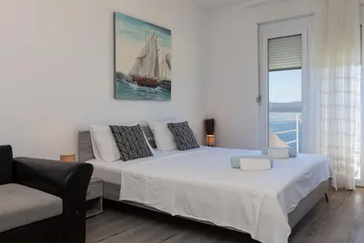 Appartement d'une chambre avec le balcon et la vue sur le mer Lokva Rogoznica, Omis (A-2973-e)