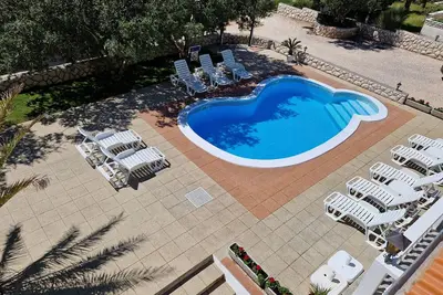 Image de Appartement de deux chambres avec la terrasse Barbat, Rab (A-4951-a)