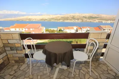 Image de Appartement de deux chambres avec la terrasse et la vue sur le mer Pag (A-9388-b)