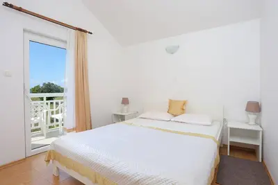 Image de Appartement d'une chambre avec la terrasse et la vue sur le mer Rogoznica (A-4162-c)