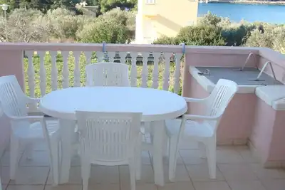 Image de Appartement d'une chambre avec la terrasse et la vue sur le mer Baie Soline, Dugi otok (A-448-a)