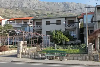 Image de Appartement de deux chambres avec le balcon Sumpetar, Omis (A-5983-a)