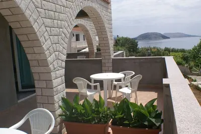Image de Appartement d'une chambre avec la terrasse et la vue sur le mer Zubovici, Pag (A-4130-c)