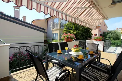 Image de Appartement de vacances dans un cadre verdoyant